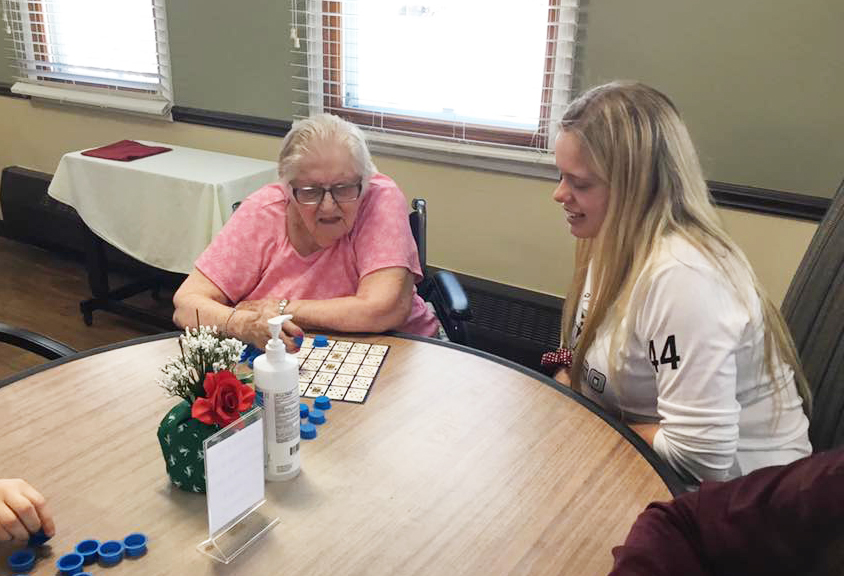 Antigo Girls Basketball Team plays games with The Bay at Eastview residents 3